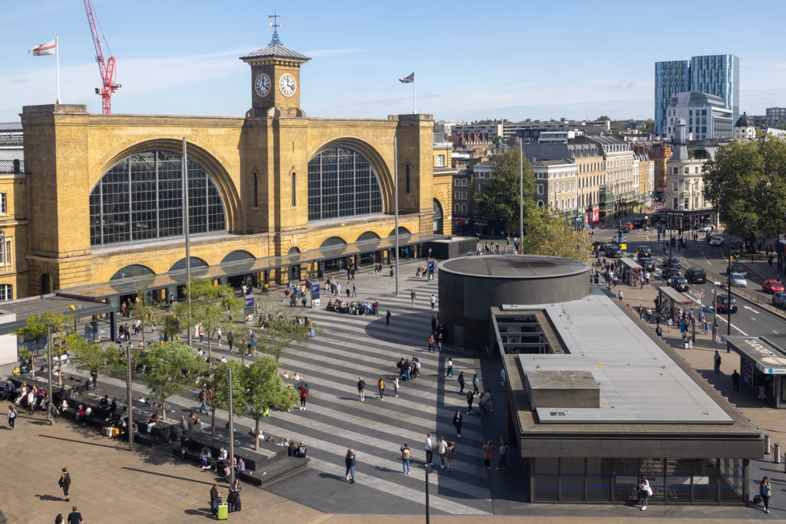 King's Cross railway station facade and square in London on a sunny day
